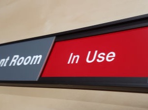 Custom made sliding signs showing vacant or in use