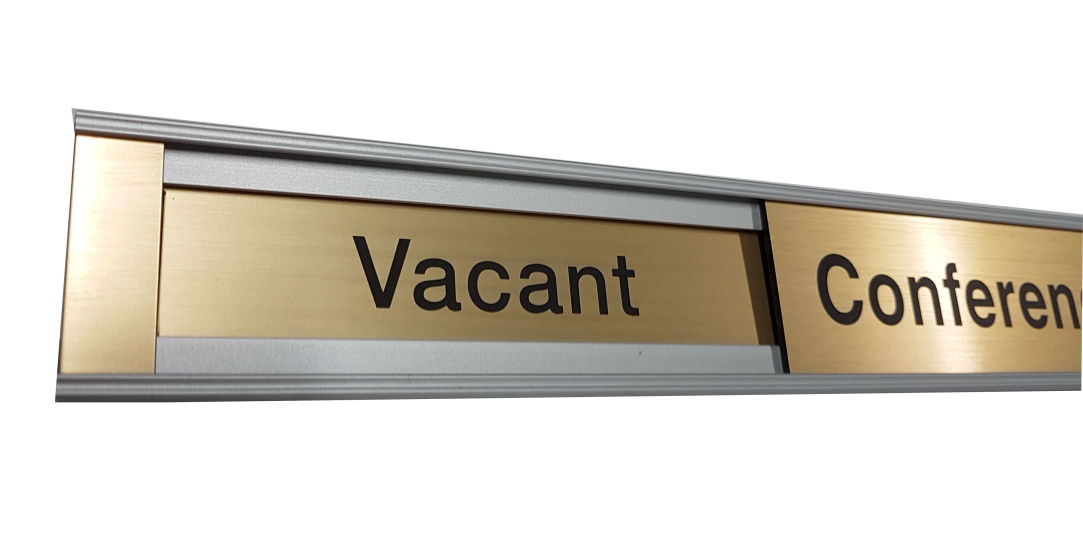 Sliding sign with brushed european gold coloured sign panels